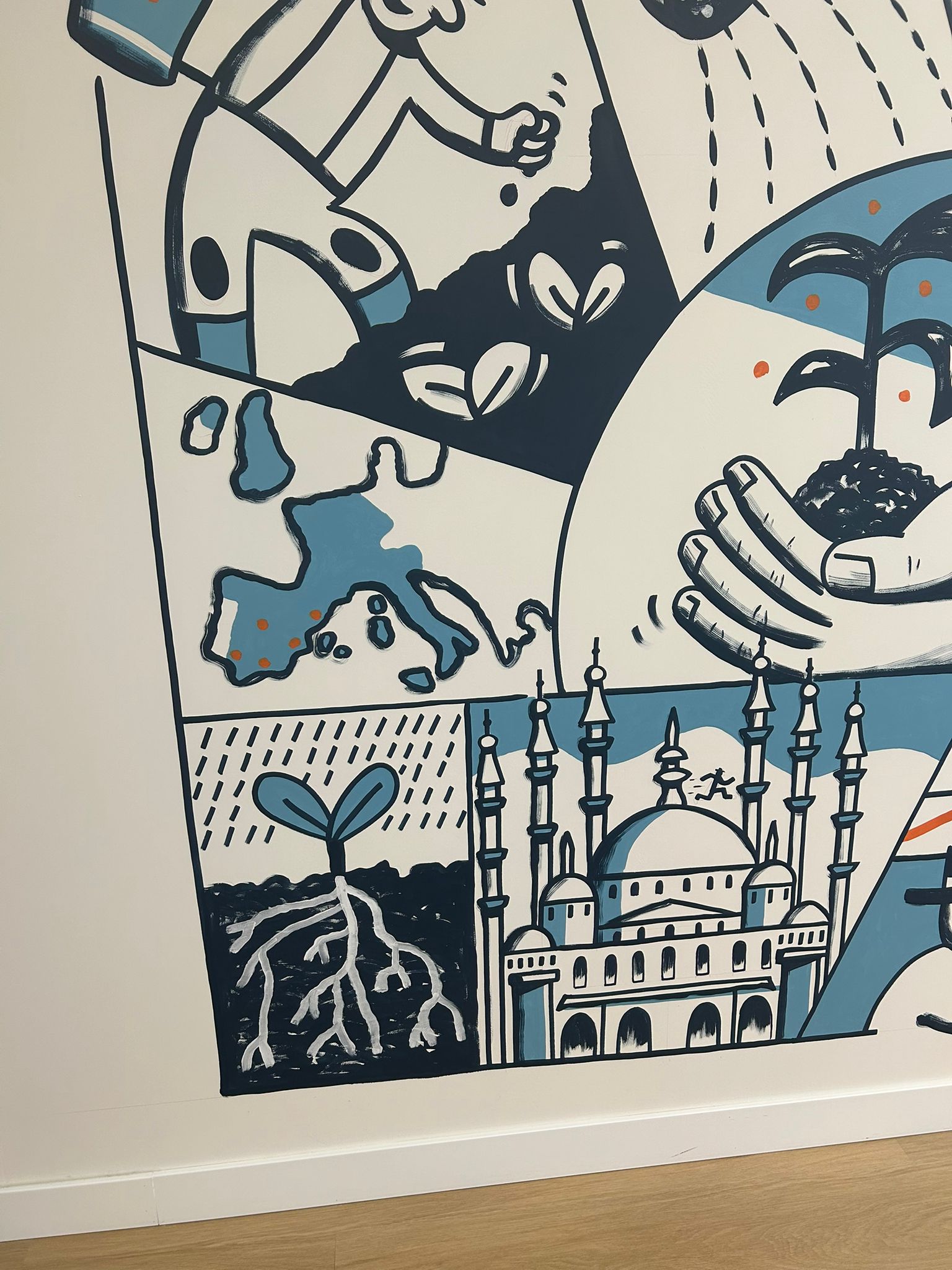 Detalle del mural con la mezquita de Santa Sofia de Estambul y una semilla brotando